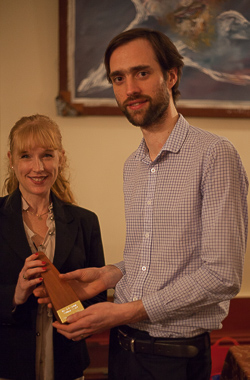 Last year's winner Catherine Cashmore hands over the EJ 